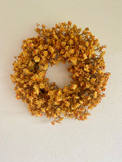 Ochre winterkrans – warme elegantie voor binnen en buiten