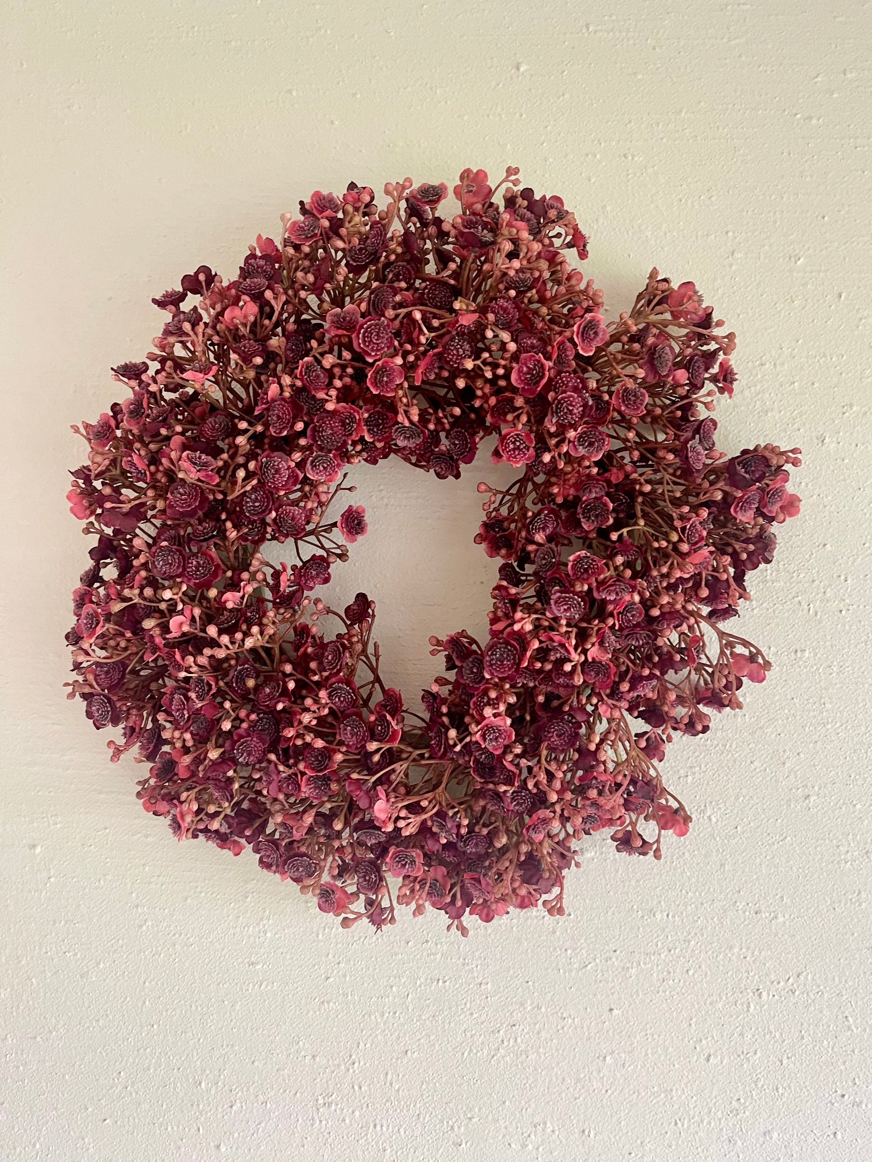 Burgundy winterkrans – warme elegantie voor binnen en buiten